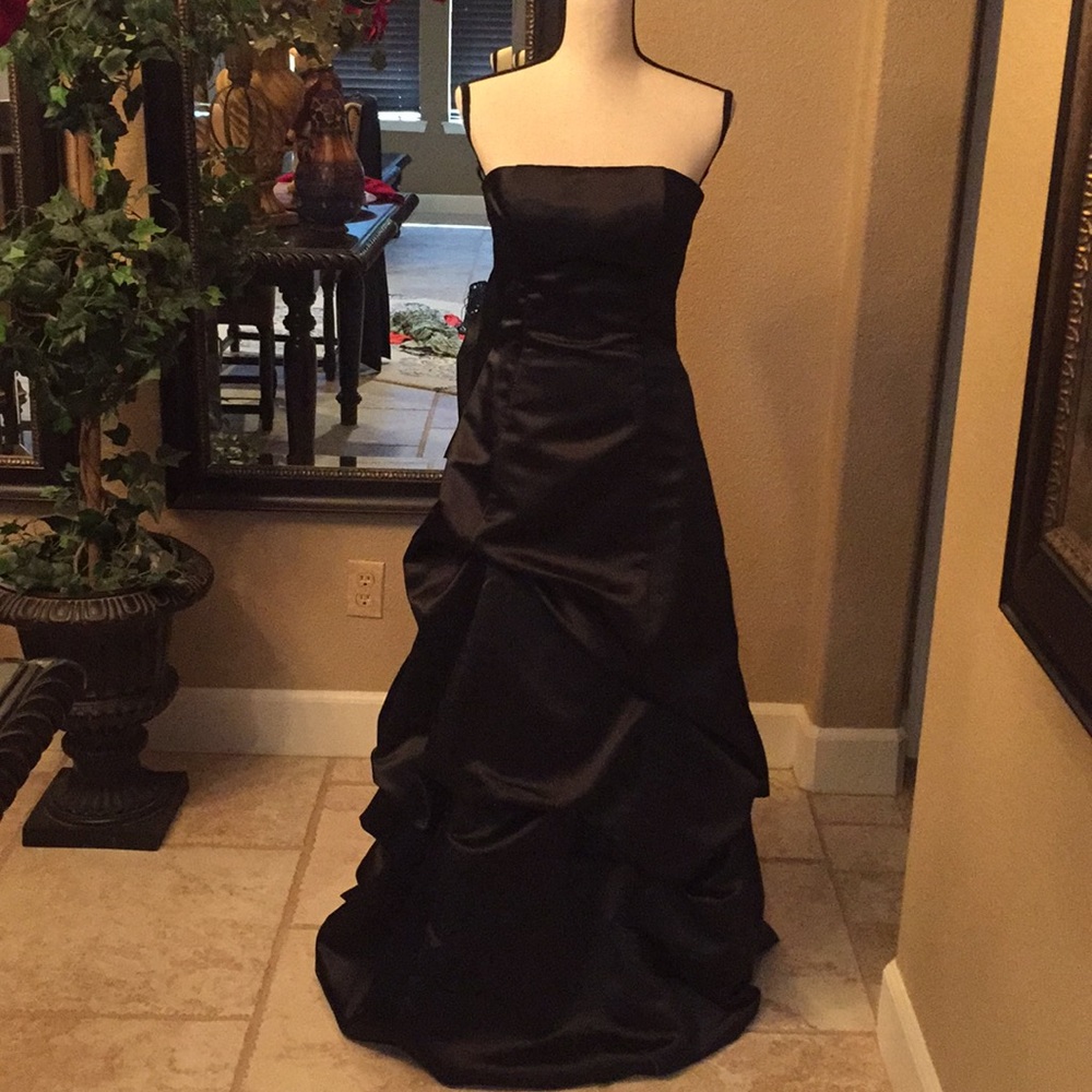 Black strapless evening gown.